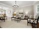Cozy living room featuring a neutral color palette and plush carpet at 3100 Stanway Ct, Waxhaw, NC 28173