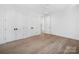 A bedroom with a walk-in closet at 3212 Willow Oak Rd, Charlotte, NC 28209