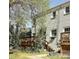 Exterior shot featuring a deck and a backyard at 3238 Pinehurst Pl # B, Charlotte, NC 28209