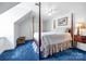 Cozy bedroom featuring a four-poster bed and white walls at 3412 Country Club Dr, Gastonia, NC 28056