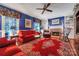 Stylish living room with hardwood floors, cozy furniture, fireplace, and windows with natural light at 3412 Country Club Dr, Gastonia, NC 28056