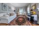 Cozy living room with hardwood floors, natural light, piano and neutral wall paint at 3412 Country Club Dr, Gastonia, NC 28056