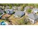 Aerial view of home showcasing the backyard, patio area, and surrounding neighborhood at 3908 Parkers Ferry Rd, Fort Mill, SC 29715