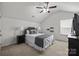 Cozy bedroom featuring carpet floors, ceiling fan and a neutral color scheme at 3908 Parkers Ferry Rd, Fort Mill, SC 29715