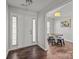 Inviting entryway features a bright interior, a classic white door and dark wood flooring at 3908 Parkers Ferry Rd, Fort Mill, SC 29715