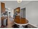 Open kitchen layout with wooden cabinets, modern appliances, and easy access to the dining area and living spaces at 3908 Parkers Ferry Rd, Fort Mill, SC 29715