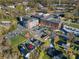 Aerial view of neighborhood including charming home with convenient parking and downtown amenities at 4 Short St, Belmont, NC 28012
