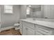 Bathroom with a marble vanity, a mirror, and a toilet at 4 Short St, Belmont, NC 28012