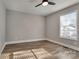 Bright bedroom with wood-look flooring and a window providing plenty of natural light at 4 Short St, Belmont, NC 28012