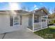 Charming home with a well-manicured lawn, and an inviting front porch, perfect for relaxation and curb appeal at 4 Short St, Belmont, NC 28012