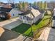 Charming home with a well-manicured lawn, and an inviting front porch, perfect for relaxation and curb appeal at 4 Short St, Belmont, NC 28012