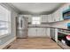 A bright kitchen featuring modern appliances, sleek countertops, and ample cabinet space at 4 Short St, Belmont, NC 28012