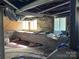 Unfinished basement area featuring stone walls, support beams and windows at 406 E Earnhardt St, Salisbury, NC 28144