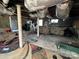 Unfinished basement area featuring stone walls, support beams and windows at 406 E Earnhardt St, Salisbury, NC 28144