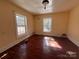 Sunlit bedroom featuring hardwood floors and classic architecture at 406 E Earnhardt St, Salisbury, NC 28144