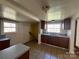 A kitchen features granite countertops, wooden cabinets, and a double sink at 406 E Earnhardt St, Salisbury, NC 28144