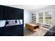 Comfortable bedroom featuring bunk beds, a built in bookcase and outdoor landscape views at 4229 Motocross Trl, Edgemoor, SC 29712