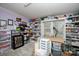 Versatile bonus room or hobby space with ample shelving for storage and display, and natural light at 4229 Motocross Trl, Edgemoor, SC 29712
