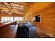 Functional kitchen space with stainless steel sinks, wooden walls, and counter at 4229 Motocross Trl, Edgemoor, SC 29712