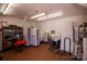 Functional storage room with organized shelving, folding tables, and ample storage space at 4229 Motocross Trl, Edgemoor, SC 29712