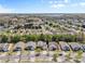 Expansive aerial view showcasing a well-planned residential neighborhood with lush greenery and tree-lined streets at 5827 Eleanor Rigby Rd, Charlotte, NC 28278