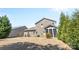 Spacious backyard with a well-maintained lawn and a charming screened-in porch at 5827 Eleanor Rigby Rd, Charlotte, NC 28278