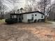 Modest single-story home featuring a cozy covered porch at 6552 Denver Heights Cir, Denver, NC 28037