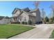 Traditional two-story home featuring an attached two-car garage and a well-manicured lawn at 7240 Baybrooke Ln, Harrisburg, NC 28075