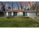 Charming home featuring a well-maintained front yard and a welcoming entrance at 7656 Eastbourne Rd, Charlotte, NC 28227