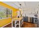 Bright kitchen with modern appliances, ample counter space, and a cozy breakfast nook at 7656 Eastbourne Rd, Charlotte, NC 28227