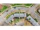 Aerial shot of townhomes with well-maintained lawns, sidewalks, and nearby streets at 840 Garden District Dr, Charlotte, NC 28202