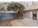 Private fenced backyard featuring patio area and mature trees at 840 Garden District Dr, Charlotte, NC 28202