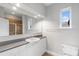 Bathroom features a large mirror, vanity, toilet, and a glass shower door at 840 Garden District Dr, Charlotte, NC 28202