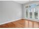 Bright bedroom with hardwood floors and a large window providing lots of natural light at 840 Garden District Dr, Charlotte, NC 28202