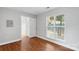 Sunlit bedroom with neutral walls and a large window at 840 Garden District Dr, Charlotte, NC 28202