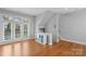 Bright, open living area with hardwood floors and large windows at 840 Garden District Dr, Charlotte, NC 28202