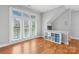 Bright loft features hardwood floors, large windows, and built-in storage at 840 Garden District Dr, Charlotte, NC 28202