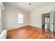 Bright bedroom with hardwood floors and natural light at 8425 E Franklin St, Mount Pleasant, NC 28124