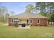 Inviting backyard featuring a patio area perfect for entertaining and relaxing outdoors at 8801 Oldenburg Dr, Mount Pleasant, NC 28124