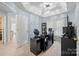 Spacious home office with a corner desk and a view into the main bedroom and other rooms at 8801 Oldenburg Dr, Mount Pleasant, NC 28124