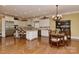 Spacious kitchen features a center island, stainless steel appliances, and hardwood floors at 9703 Cotton Stand Rd, Charlotte, NC 28277