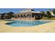 Community pool with a large pool house at 9703 Cotton Stand Rd, Charlotte, NC 28277