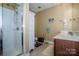 Tidy bathroom with a glass-enclosed shower and a clean vanity area at 1027 Brookline Dr, Huntersville, NC 28078