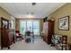 Bedroom with a window, desk, rocking chair and a large antique armoire at 1027 Brookline Dr, Huntersville, NC 28078