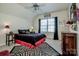 Comfortable bedroom with ceiling fan, natural light and zebra print rug at 1027 Brookline Dr, Huntersville, NC 28078