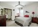 Bright bedroom with a queen bed, closet, and natural light from the window at 1027 Brookline Dr, Huntersville, NC 28078