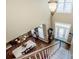 Bright foyer with staircase, hardwood floors, and a view of the dining area at 1027 Brookline Dr, Huntersville, NC 28078