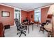 Office space featuring a desk, leather chair, and neutral-toned carpet at 1027 Brookline Dr, Huntersville, NC 28078