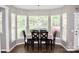 Bright dining area with large windows and a table set for a meal at 13127 Centennial Commons Pkwy, Huntersville, NC 28078