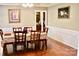 Traditional dining room with elegant decor and hardwood floors at 13127 Centennial Commons Pkwy, Huntersville, NC 28078
